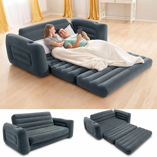 Gray inflatable sofa bed in living room setting.