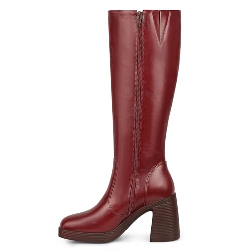 Black leather platform boots with square toe and chunky block heel.