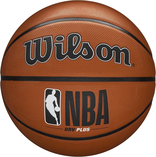 Wilson NBA DRV Pro Basketball in action on a brightly lit indoor court.