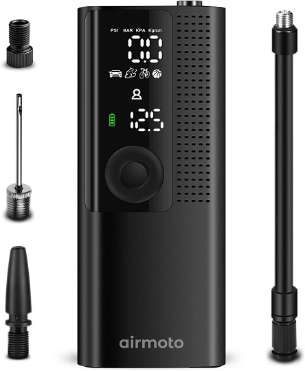 Airmoto Tire Inflator in hand, showcasing its compact size.