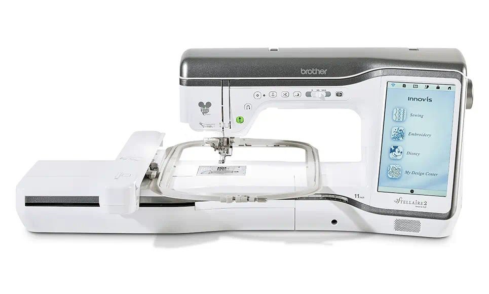 Brother Stellaire 2 Innov-is XJ2 Sewing Machine with Disney embroidery designs displayed on a touchscreen.