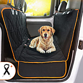 Dog enjoying a comfy ride in a car seat cover