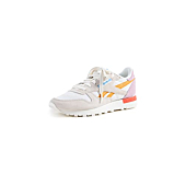 Reebok Women's Classic Leather Sneakers, Chalk/Ochre/Infused Lilac, Off White, 7 Medium US