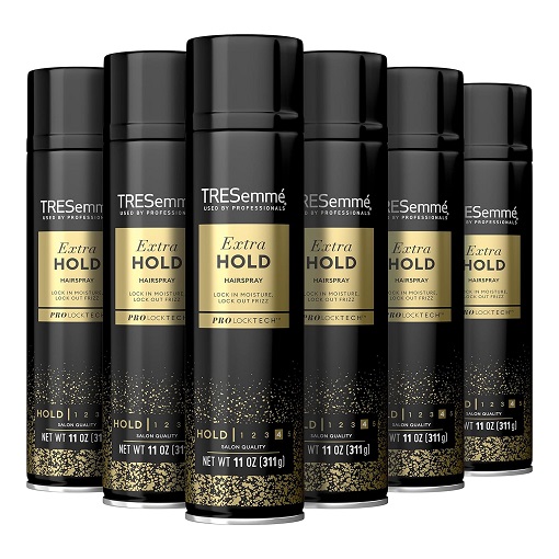 Woman with sleek, frizz-free hair thanks to TRESemmé Extra Hold Hairspray