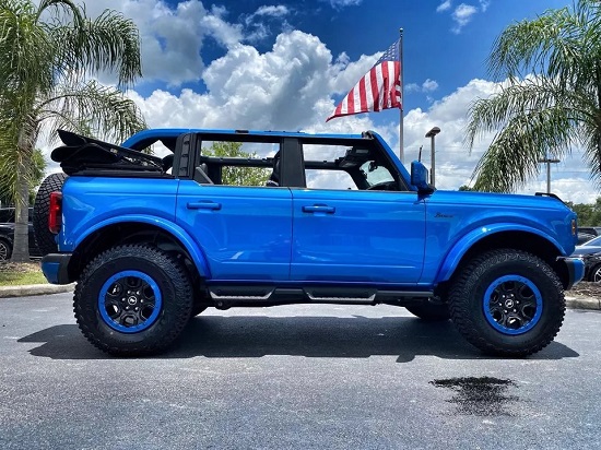 2023 Ford Bronco V6 Bay Shore Sasquatch Black Diamond Custom showcasing its aggressive stance with lifted suspension and large tires.