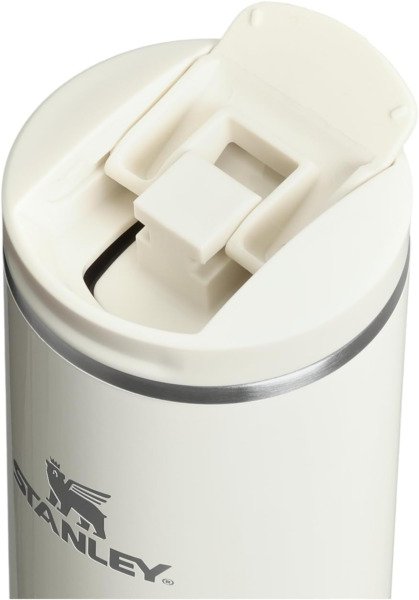 Front view of Stanley Transit FlipTop 20 oz travel mug in Cream Gloss with logo