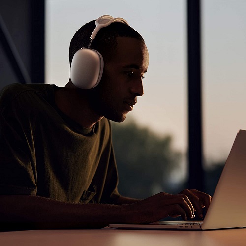 AirPods Max blue color headphones, full product shot showing the headband and ear cups against a white background