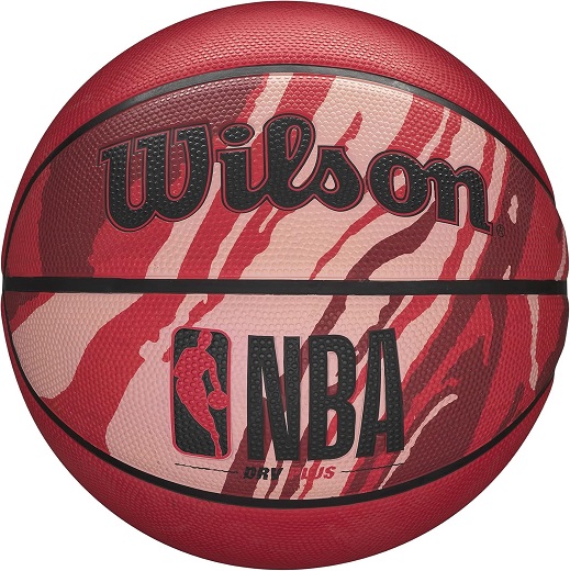 Wilson NBA DRV Pro Basketball in action on a brightly lit indoor court.