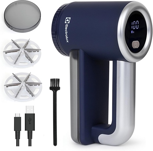 Electrolux Fabric Shaver removing lint from a black sweater 