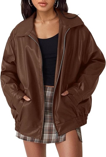 Model wearing the jacket with jeans and boots, showcasing its versatility for fall outfits.