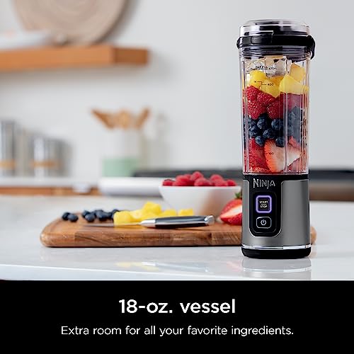 Ninja Blast Portable Blender on a counter with fresh fruit.

