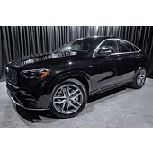 A black 2024 Mercedes-Benz GLE AMG 53 Coupe SUV with 10 miles on the odometer and AMG enhancements