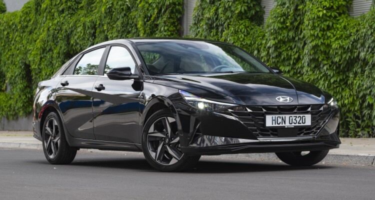 A black 2021 Hyundai Elantra parked on Street - Most popular sedan vehicle from Hyundai brand in the world